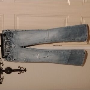 575 Low-Rise Light Wash Distressed Flare Jeans Size 28